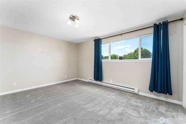 201 Pennsylvania Ave Unit 15, Wenatchee, WA 98801 - carpeted spare room with a baseboard radiator and baseboards