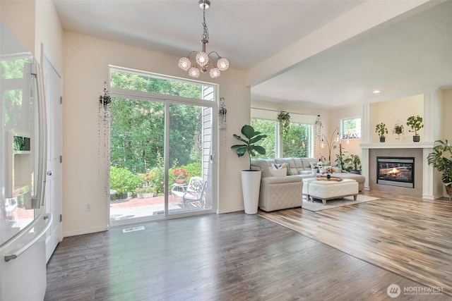 35055 41st Pl S, Auburn, WA 98001 - living room with wood finished floors, healthy amount of natural light, a chandelier, and recessed lighting