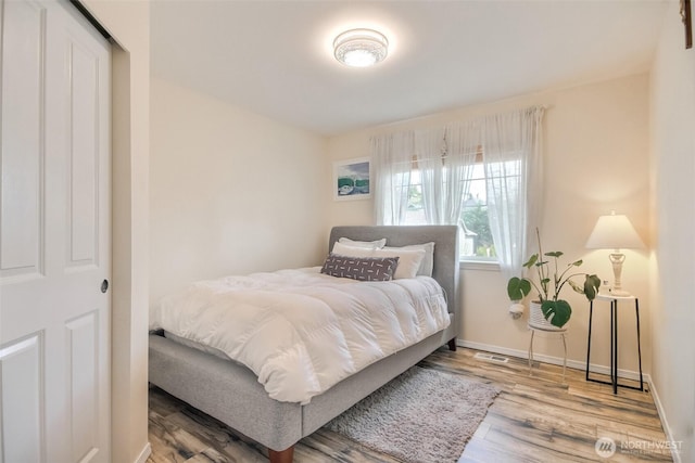 35055 41st Pl S, Auburn, WA 98001 - bedroom featuring wood finished floors and baseboards