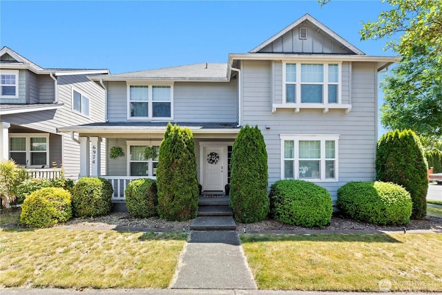 6974 Prism St SE, Lacey, WA 98513 - traditional home with a front lawn and board and batten siding
