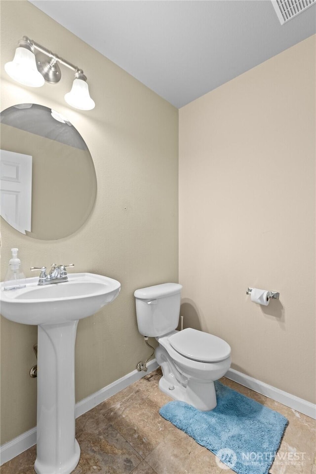 6974 Prism St SE, Lacey, WA 98513 - half bath featuring toilet and a sink