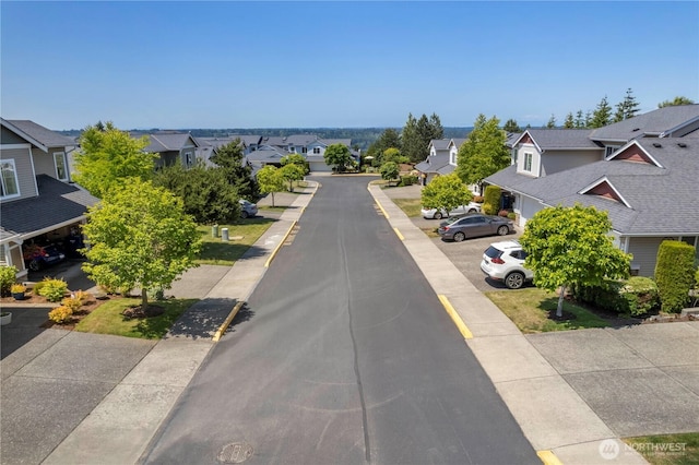 7103 Hazel Pl SE, Auburn, WA 98092 - view of asphalt street with a residential view