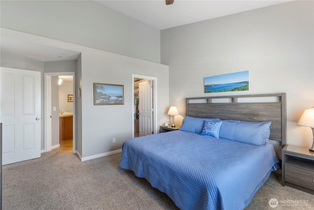 7103 Hazel Pl SE, Auburn, WA 98092 - carpeted bedroom with a spacious closet, ensuite bath, and a ceiling fan