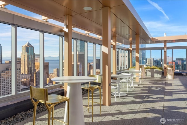 800 Columbia St Unit 2503, Seattle, WA 98104 - view of patio with a skyline view