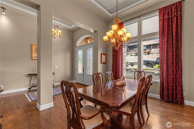 1075 Ridge Crest Dr, Wenatchee, WA 98801 - dining room featuring a chandelier, wood finished floors, and ornamental molding