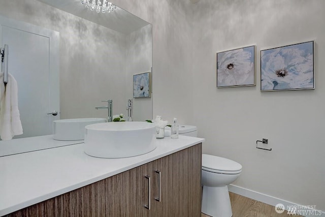 8707 116th Ave NE Unit A, Kirkland, WA 98033 - bathroom with vanity and wood finished floors