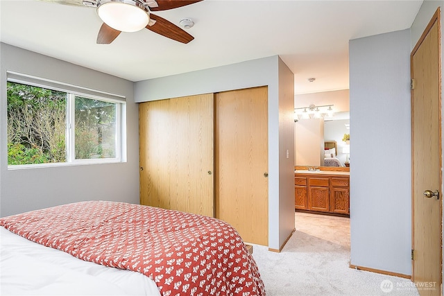 21305 50th Ave W Unit B2, Mountlake Terrace, WA 98043 - bedroom featuring light colored carpet, a closet, and ceiling fan