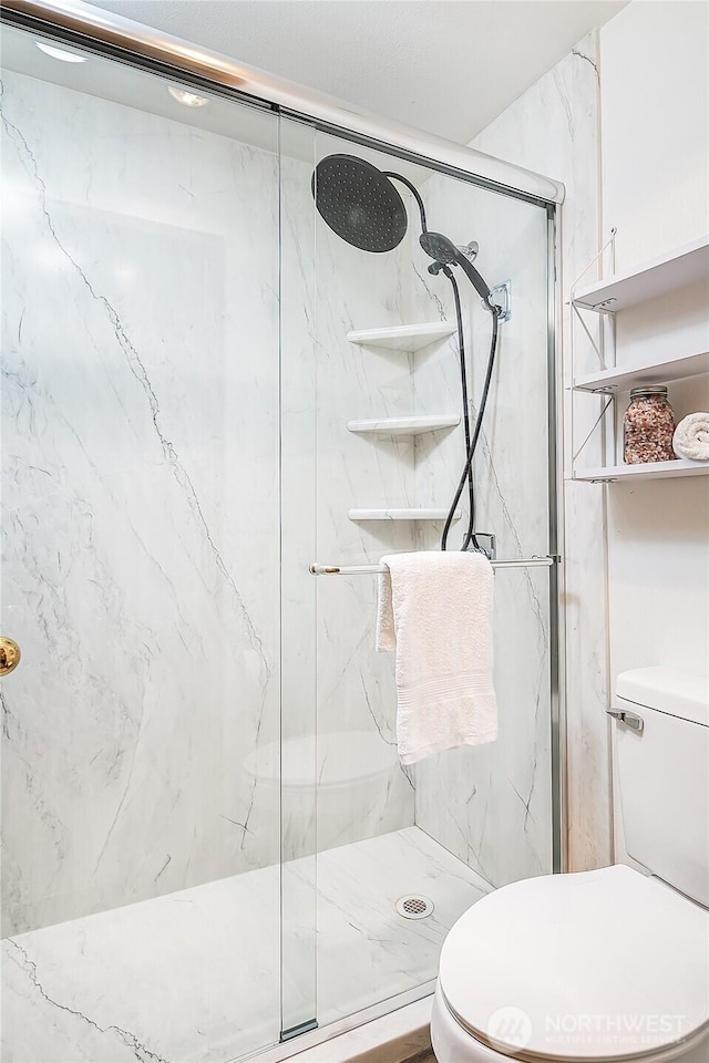 21305 50th Ave W Unit B2, Mountlake Terrace, WA 98043 - bathroom with toilet and a marble finish shower