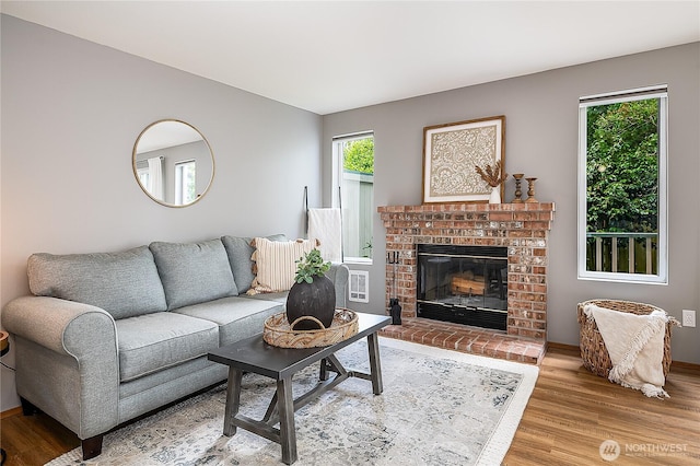 21305 50th Ave W Unit B2, Mountlake Terrace, WA 98043 - living room with wood finished floors and a fireplace