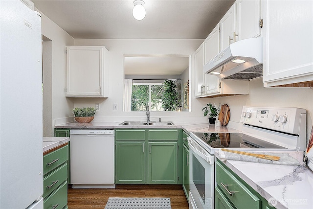 21305 50th Ave W Unit B2, Mountlake Terrace, WA 98043 - kitchen featuring white appliances, under cabinet range hood, green cabinetry, and white cabinetry