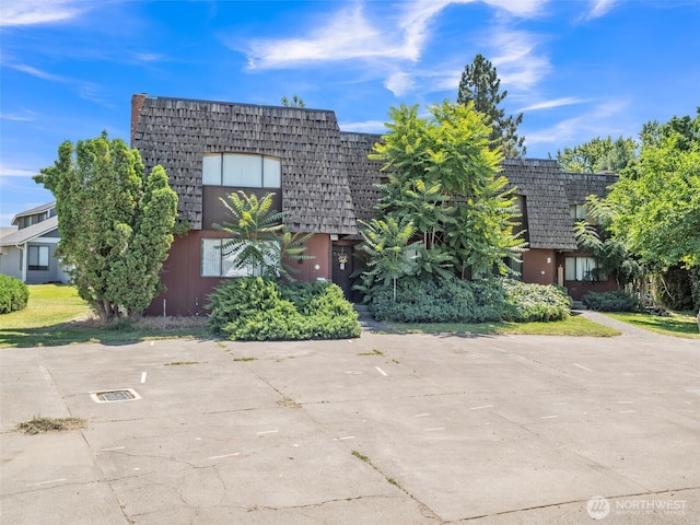 238 NE Damson Pl, College Place, WA 99324 - view of front of home featuring mansard roof