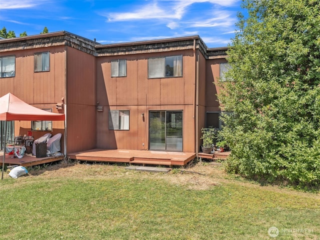 238 NE Damson Pl, College Place, WA 99324 - rear view of property with a yard and a wooden deck