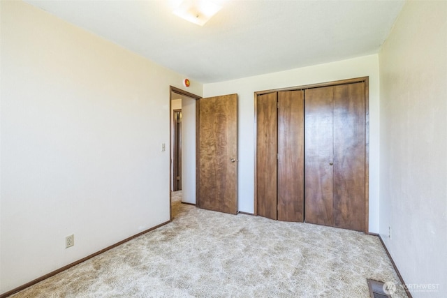 238 NE Damson Pl, College Place, WA 99324 - unfurnished bedroom with carpet floors and a closet