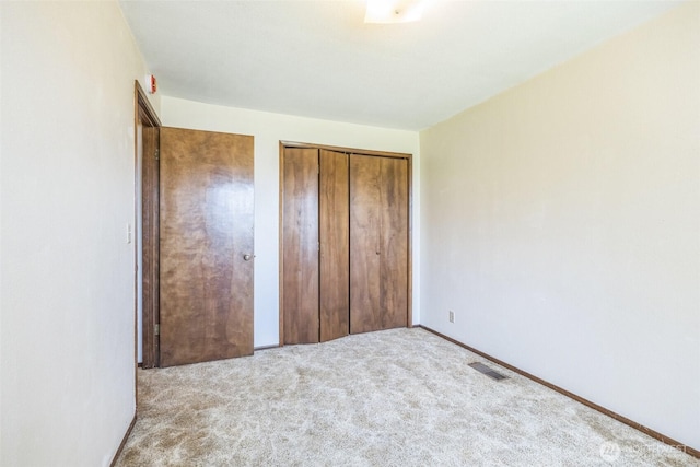 238 NE Damson Pl, College Place, WA 99324 - unfurnished bedroom with carpet floors and baseboards