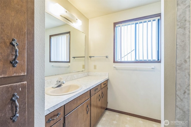 238 NE Damson Pl, College Place, WA 99324 - bathroom featuring vanity and baseboards