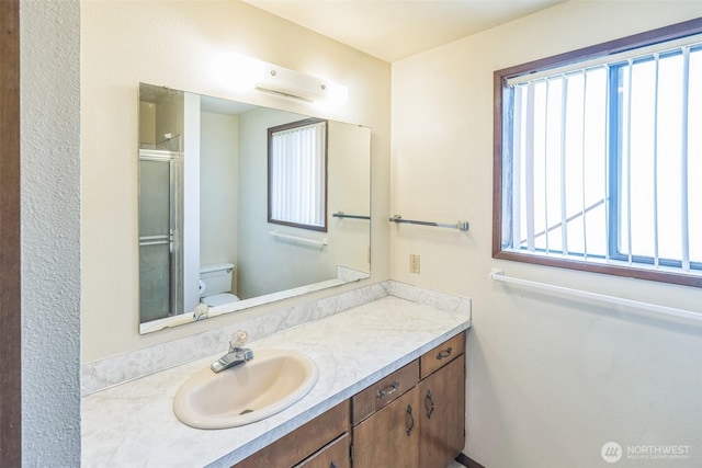 238 NE Damson Pl, College Place, WA 99324 - bathroom featuring vanity and a shower stall