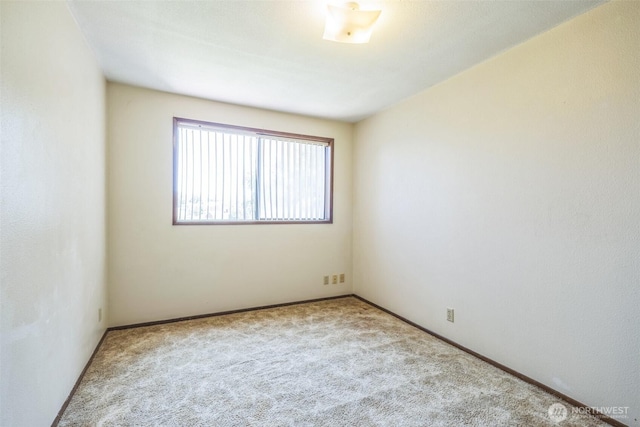 238 NE Damson Pl, College Place, WA 99324 - unfurnished room with carpet flooring and baseboards