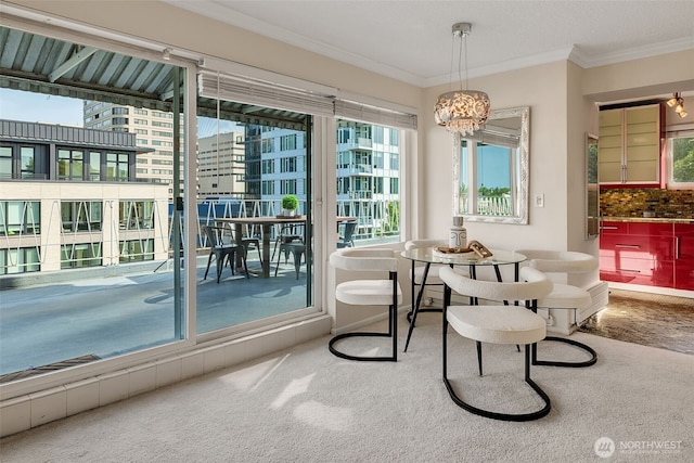 1200 Boylston Ave Unit 901, Seattle, WA 98101 - sitting room with carpet floors, ornamental molding, and a chandelier