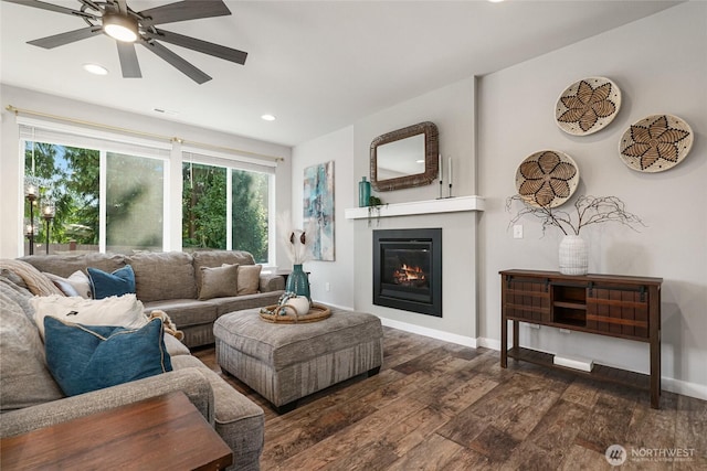 1705 85th Ave SE, Lake Stevens, WA 98258 - living room featuring wood finished floors, a glass covered fireplace, ceiling fan, and recessed lighting