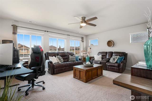 1705 85th Ave SE, Lake Stevens, WA 98258 - living room featuring a ceiling fan, light colored carpet, and a desk