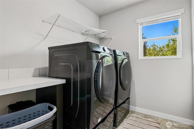 1705 85th Ave SE, Lake Stevens, WA 98258 - washroom featuring washing machine and dryer and baseboards