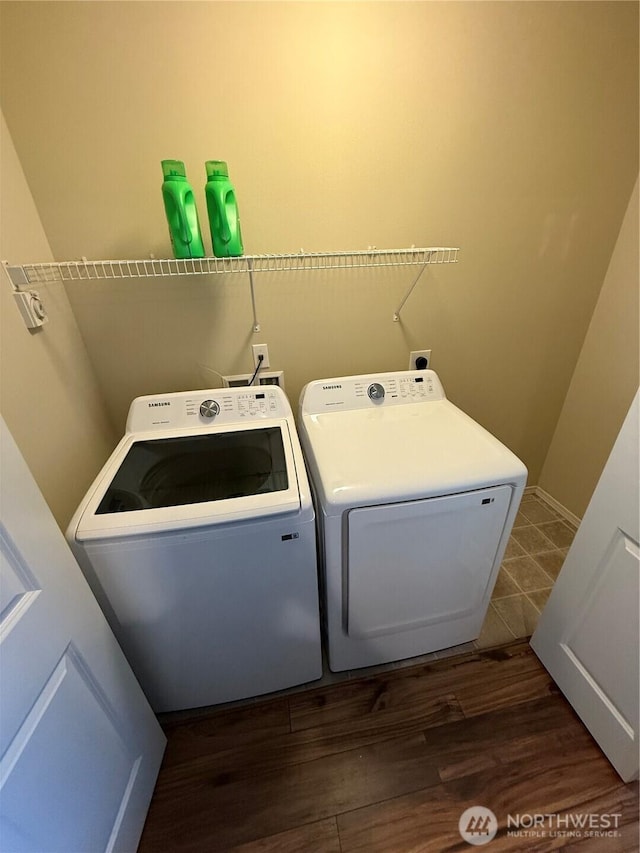 1306 Brackenridge Ave, Dupont, WA 98327 - laundry area featuring independent washer and dryer and wood finished floors