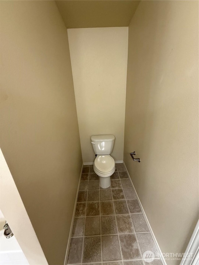 1306 Brackenridge Ave, Dupont, WA 98327 - bathroom with toilet and tile patterned floors