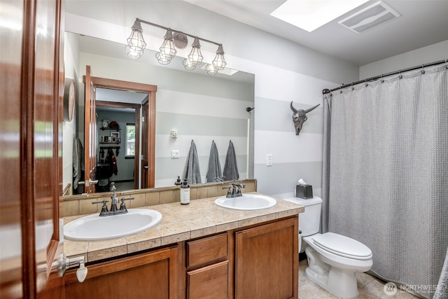 1141 Bell Hill Pl, Dupont, WA 98327 - bathroom with double vanity, tile patterned flooring, and a shower with curtain