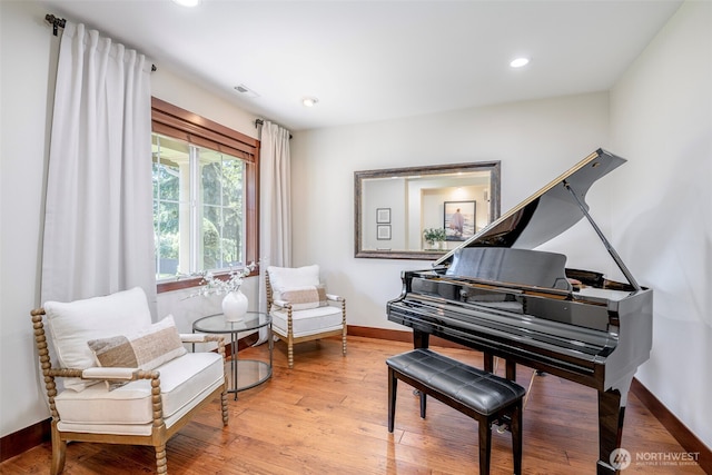 1141 Bell Hill Pl, Dupont, WA 98327 - sitting room with recessed lighting and wood finished floors