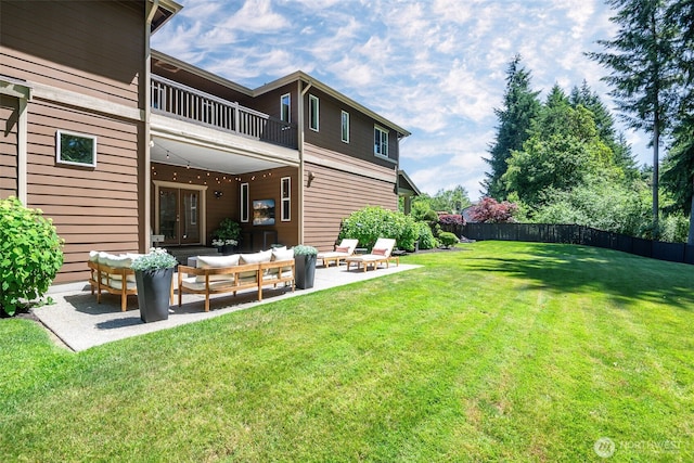 1141 Bell Hill Pl, Dupont, WA 98327 - fenced backyard featuring a balcony, an outdoor hangout area, a patio, and french doors