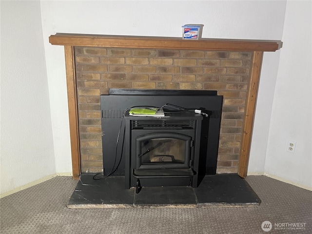 8407 18th Ave W Unit 4-103, Everett, WA 98204 - detailed view of carpet floors and a wood stove