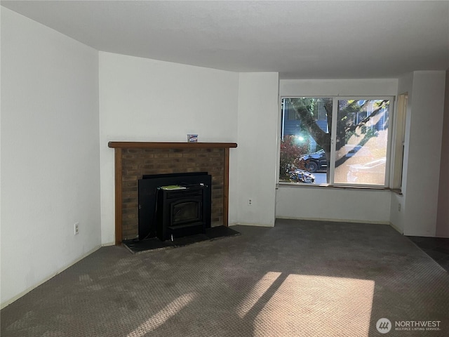 8407 18th Ave W Unit 4-103, Everett, WA 98204 - unfurnished living room with carpet and a wood stove