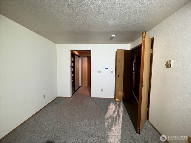 8407 18th Ave W Unit 4-103, Everett, WA 98204 - spare room with carpet flooring and a textured ceiling