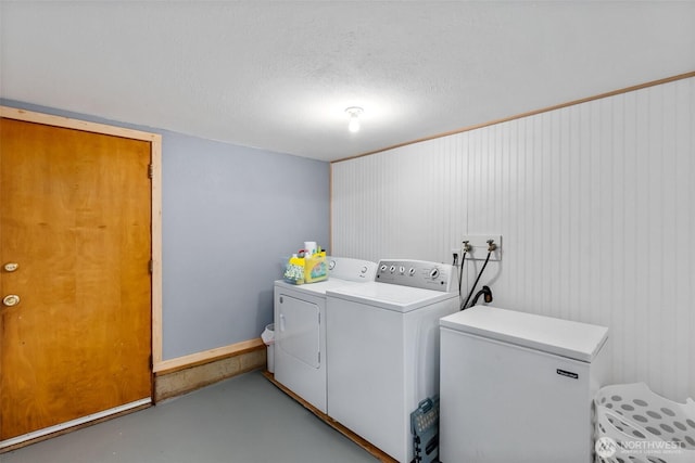 508 Ocean Beach Rd, Hoquiam, WA 98550 - laundry room featuring washing machine and dryer and a textured ceiling