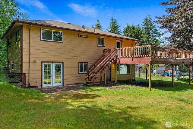 508 Ocean Beach Rd, Hoquiam, WA 98550 - back of house with stairs, a deck, and a lawn