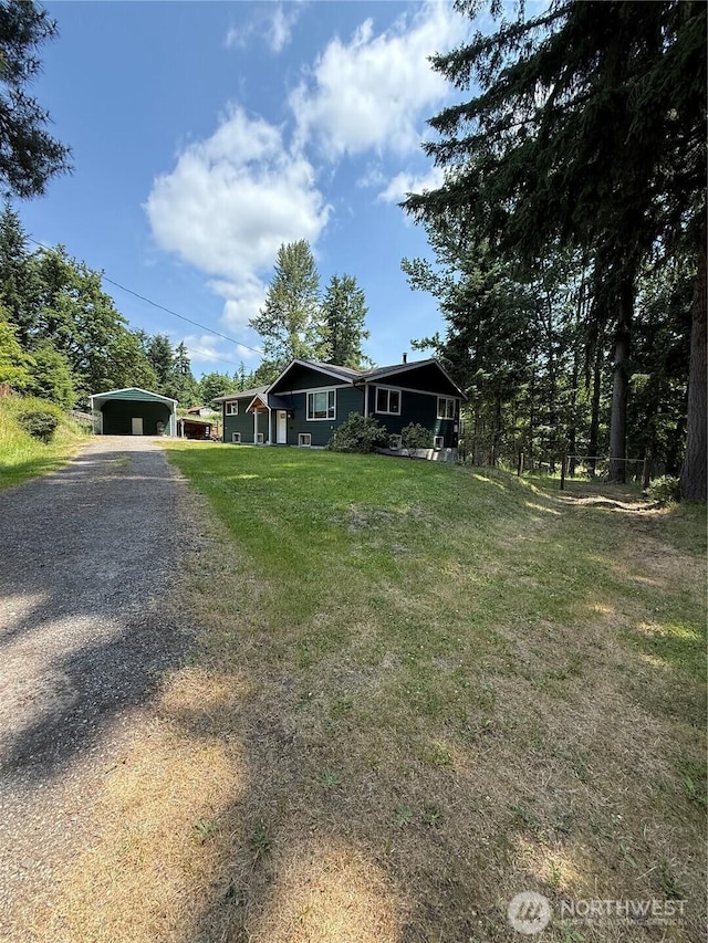 5645 Lento Pl SE, Olympia, WA 98513 - single story home with a carport, gravel driveway, and a front yard