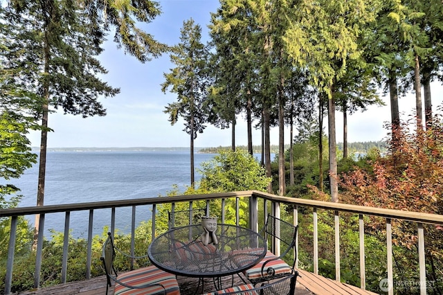 662 E Stadium Beach Rd E, Grapeview, WA 98546 - balcony with outdoor dining area and a deck with water view