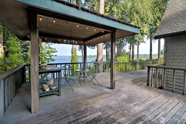 662 E Stadium Beach Rd E, Grapeview, WA 98546 - wooden deck with a water view