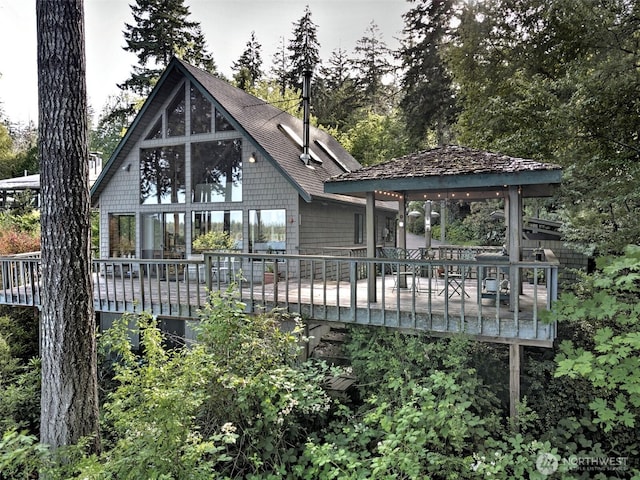 662 E Stadium Beach Rd E, Grapeview, WA 98546 - rear view of property with a wooden deck and a gazebo