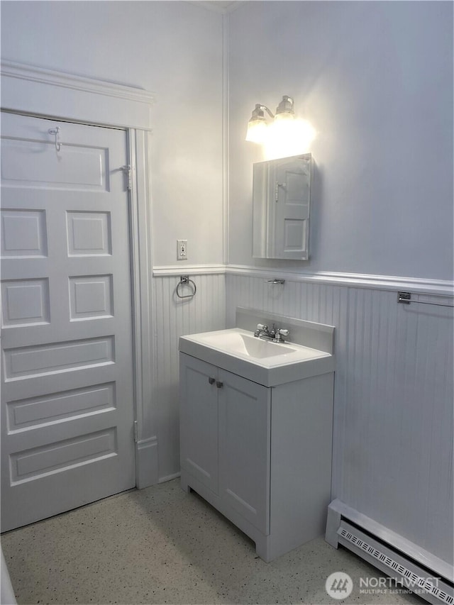 3722 Oakes Ave, Everett, WA 98201 - bathroom with a baseboard heating unit, a wainscoted wall, and vanity
