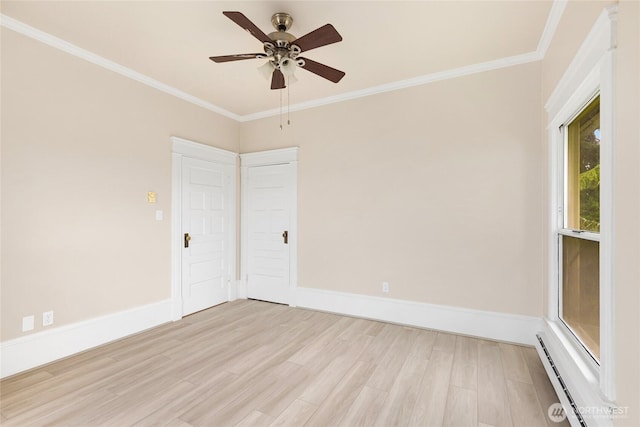 3722 Oakes Ave, Everett, WA 98201 - spare room with light wood-style flooring, a baseboard heating unit, crown molding, and a ceiling fan