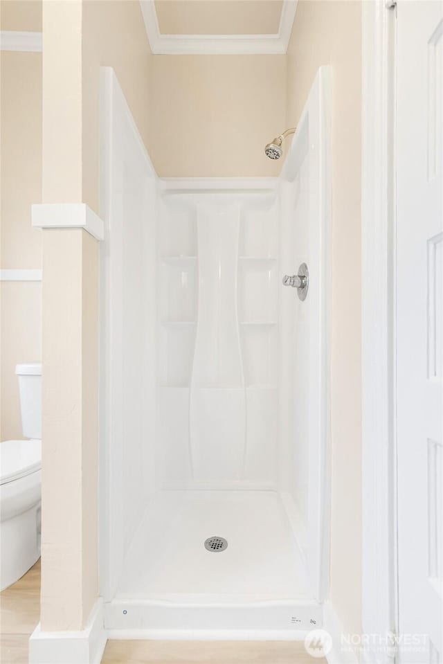 3722 Oakes Ave, Everett, WA 98201 - bathroom featuring crown molding, a stall shower, and wood finished floors