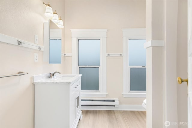 3722 Oakes Ave, Everett, WA 98201 - bathroom featuring a baseboard radiator and vanity