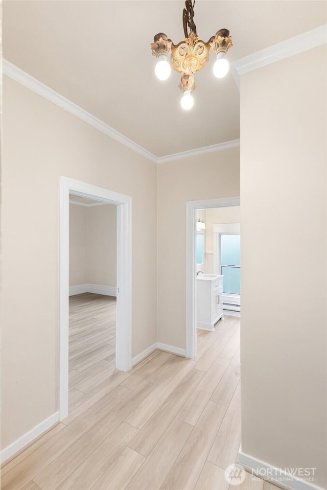 3722 Oakes Ave, Everett, WA 98201 - hall with light wood finished floors, crown molding, and a chandelier