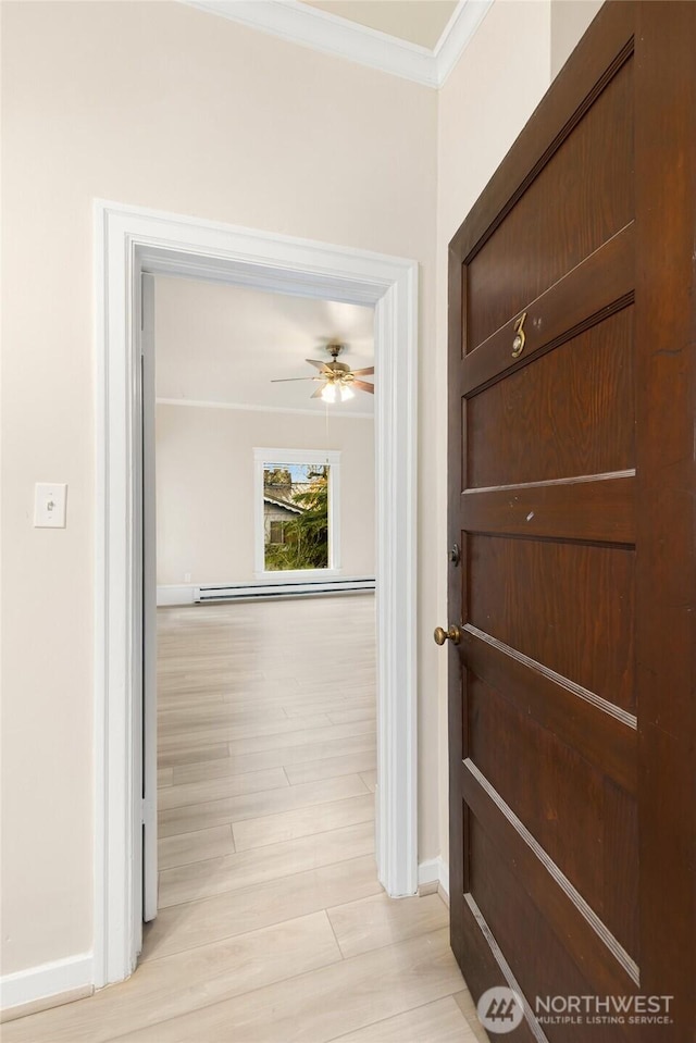 3722 Oakes Ave, Everett, WA 98201 - hall featuring a baseboard radiator, ornamental molding, and light wood finished floors