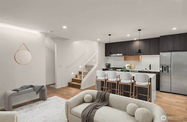 926 23rd Ave, Seattle, WA 98122 - living area with stairway, recessed lighting, and light wood-style flooring