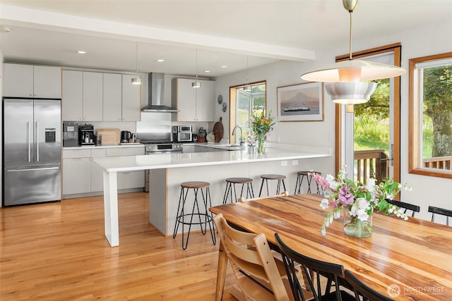 16305 Crescent Dr SW, Vashon, WA 98070 - dining space with healthy amount of natural light, light wood-style floors, and recessed lighting
