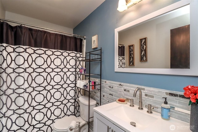 6530 Newaukum Pl NE, Bremerton, WA 98311 - bathroom featuring vanity, tile walls, decorative backsplash, and a shower with curtain