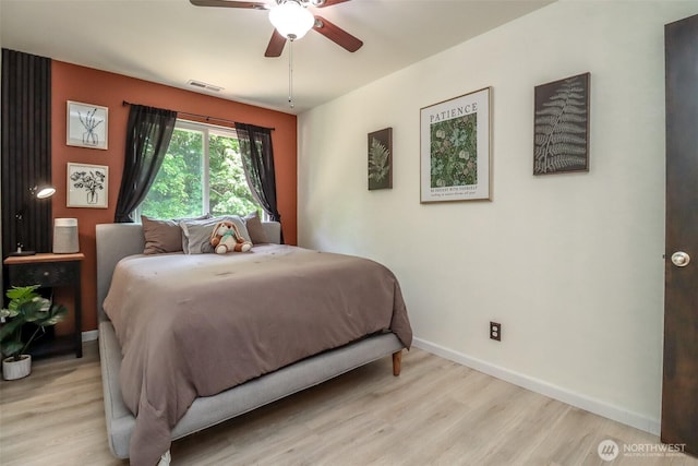 6530 Newaukum Pl NE, Bremerton, WA 98311 - bedroom featuring light wood-style flooring and a ceiling fan