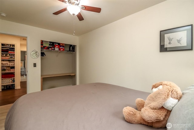 6530 Newaukum Pl NE, Bremerton, WA 98311 - bedroom featuring wood finished floors, a closet, and ceiling fan